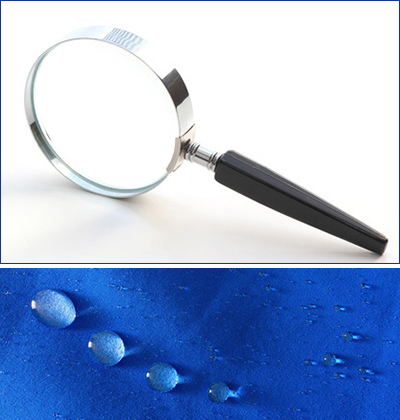 Magnifying glass and drops of water